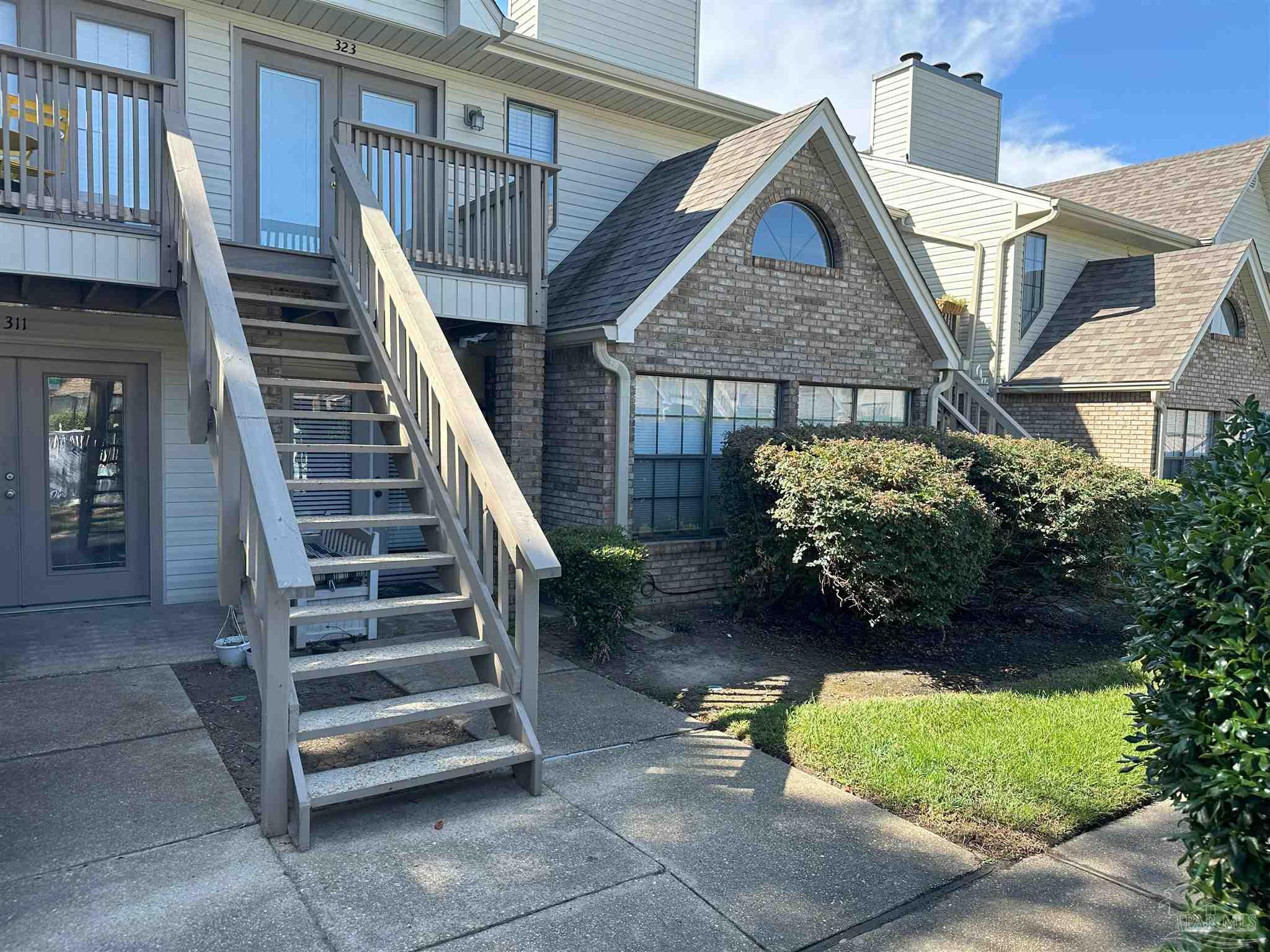 7150 Plantation Road, Unit 312 Pensacola, FL 32504 - Photo 2 of 23 Walking to the entrance