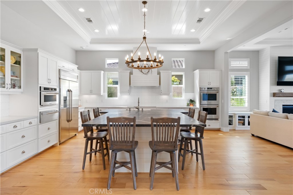 1594 Eucalyptus Road Nipomo, CA 93444 - Photo 13 of 75 a view of a dining room with furniture window and wooden floor