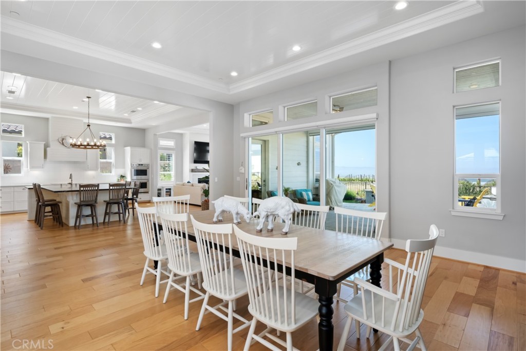 1594 Eucalyptus Road Nipomo, CA 93444 - Photo 21 of 75 a view of a dining room with furniture and wooden floor