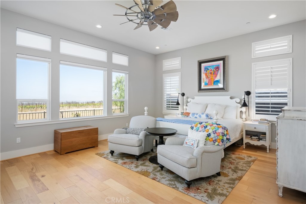 1594 Eucalyptus Road Nipomo, CA 93444 - Photo 36 of 75 a living room with furniture and floor to ceiling windows