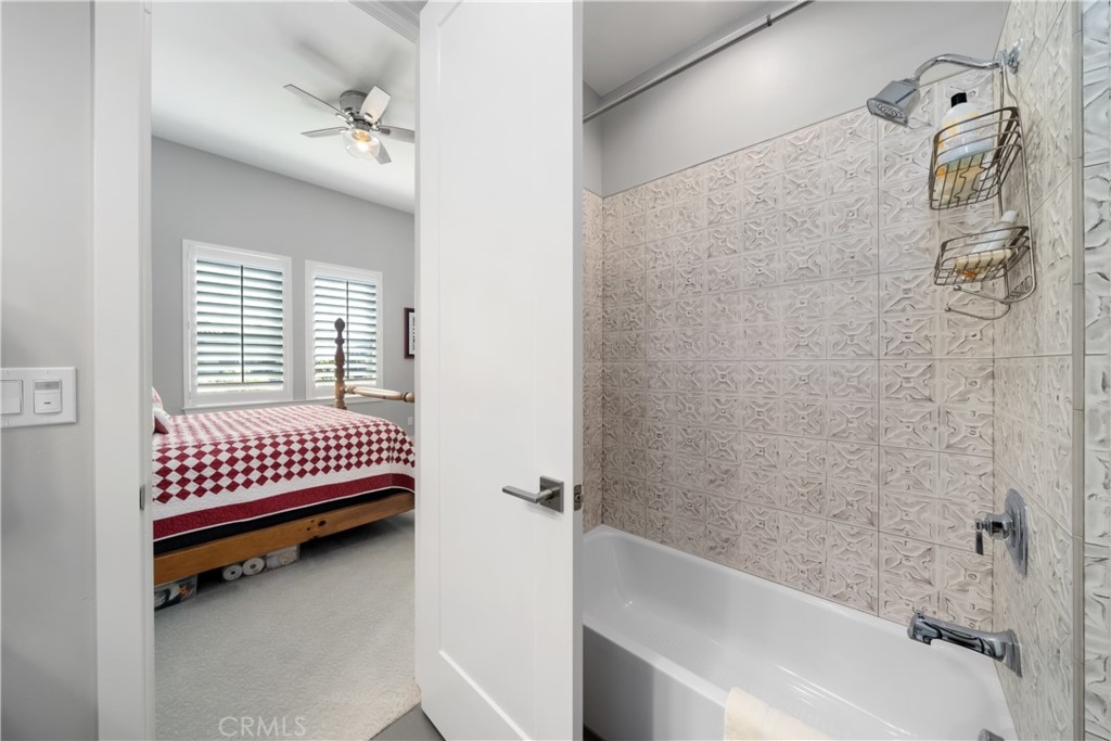 1594 Eucalyptus Road Nipomo, CA 93444 - Photo 47 of 75 a bathroom with a bathtub and shower