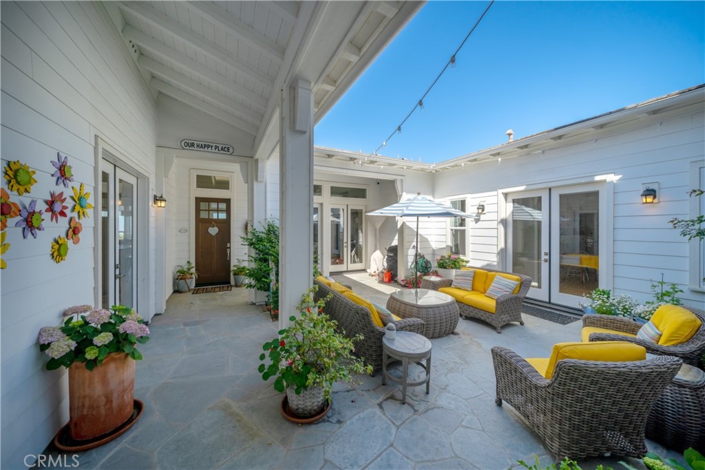 1594 Eucalyptus Road Nipomo, CA 93444 - Photo 5 of 75 a lobby with furniture and potted plant