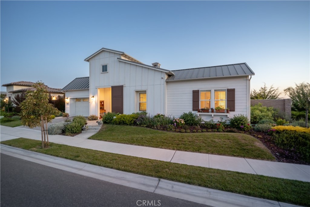 1594 Eucalyptus Road Nipomo, CA 93444 - Photo 62 of 75 a front view of a house with a yard