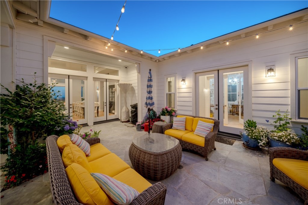 1594 Eucalyptus Road Nipomo, CA 93444 - Photo 64 of 75 a outdoor living space with furniture and a potted plant