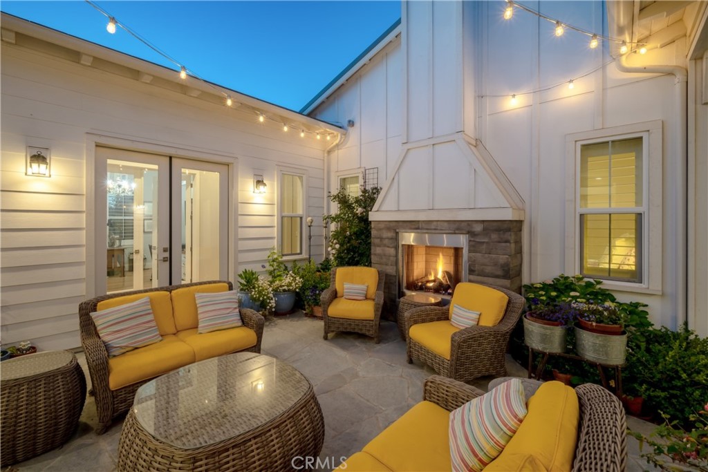 1594 Eucalyptus Road Nipomo, CA 93444 - Photo 65 of 75 a living room with furniture and a fireplace