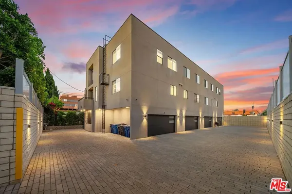 a view of a building with a street