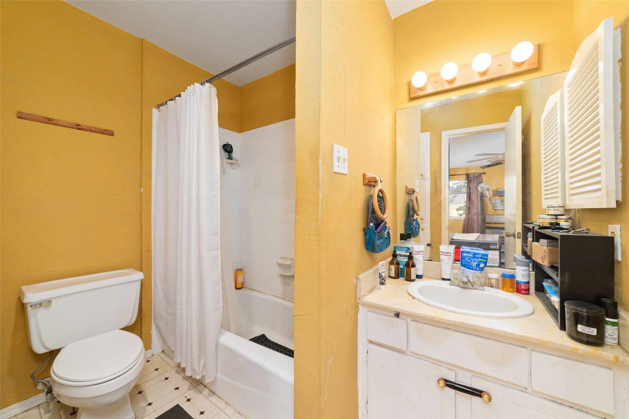 5800 Lumberdale Road, Unit 55 Houston, TX 77092 - Photo 20 of 34 a bathroom with a sink a toilet and shower