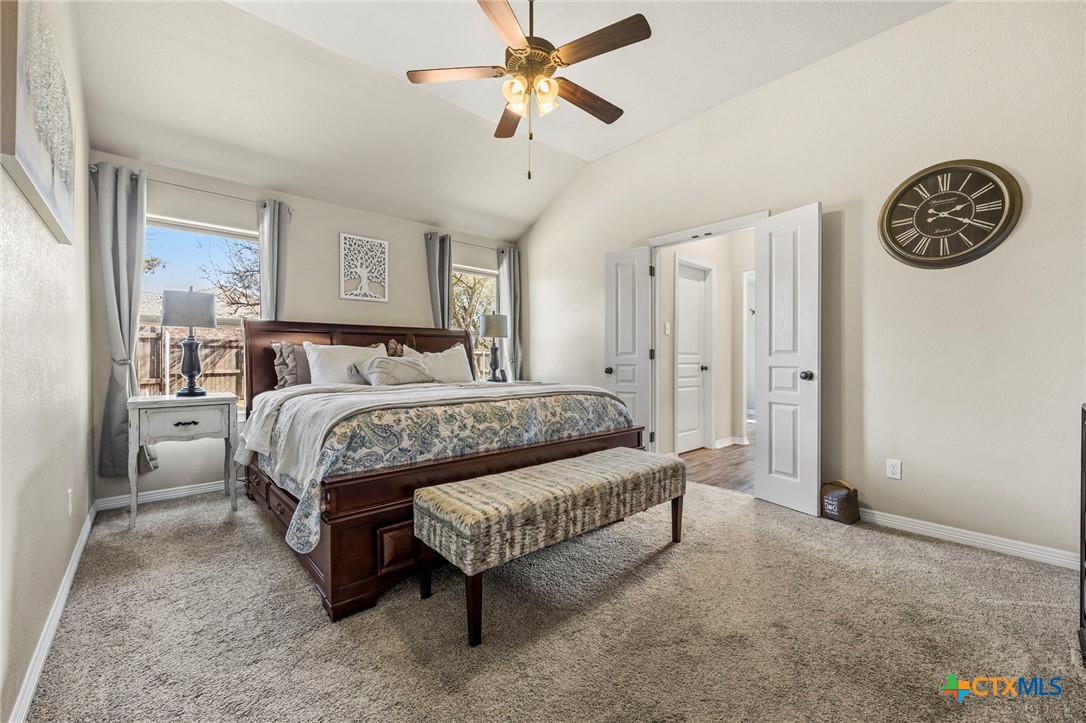 166 Mountain Rose Road Belton, TX 76513 - Photo 17 of 37 a bedroom with a bed dresser and a window