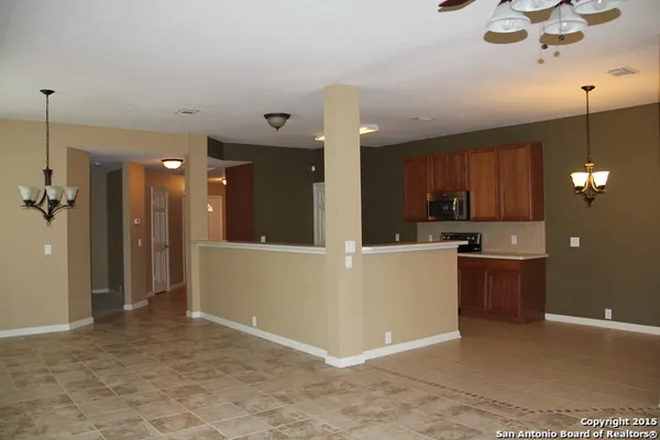 a view of a kitchen and a chandelier