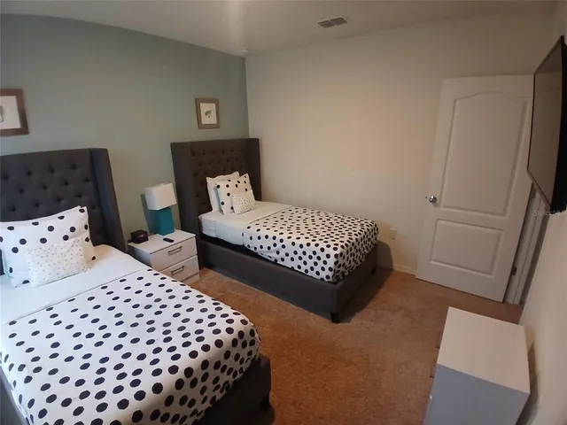 a room with furniture and a mirror