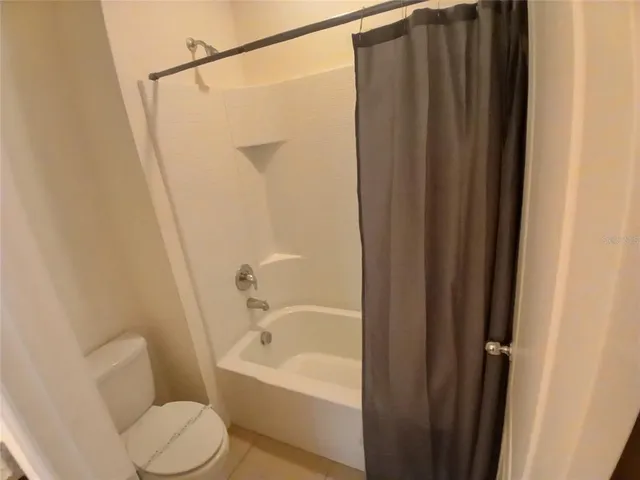 a view of an outdoor space and tennis court