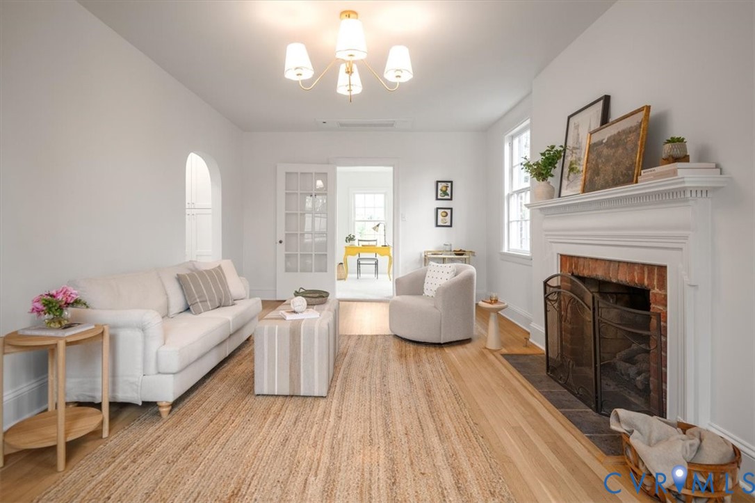 4703 Sylvan Road Richmond, VA 23225 - Photo 13 of 49 Family room with gas fireplace, looking into the o