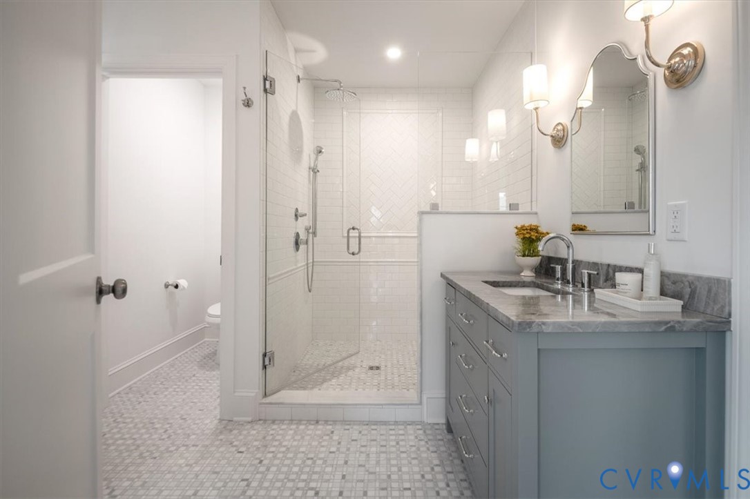 4703 Sylvan Road Richmond, VA 23225 - Photo 23 of 49 Primary bathroom with double vanities, walk in sho