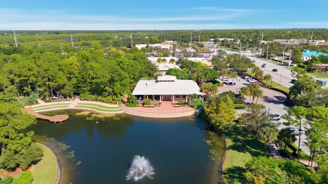 a view of a swimming pool with a lake view