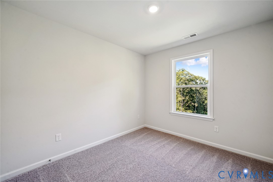 342 Mt Mccauley Way Aylett, VA 23009 - Photo 16 of 31 an empty room with a window