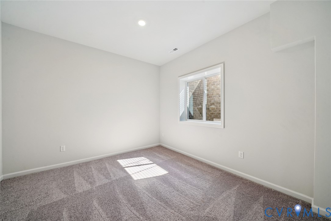 342 Mt Mccauley Way Aylett, VA 23009 - Photo 18 of 31 an empty room with a window