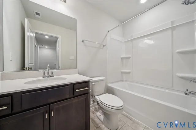 a bathroom with a sink a toilet and a bathtub