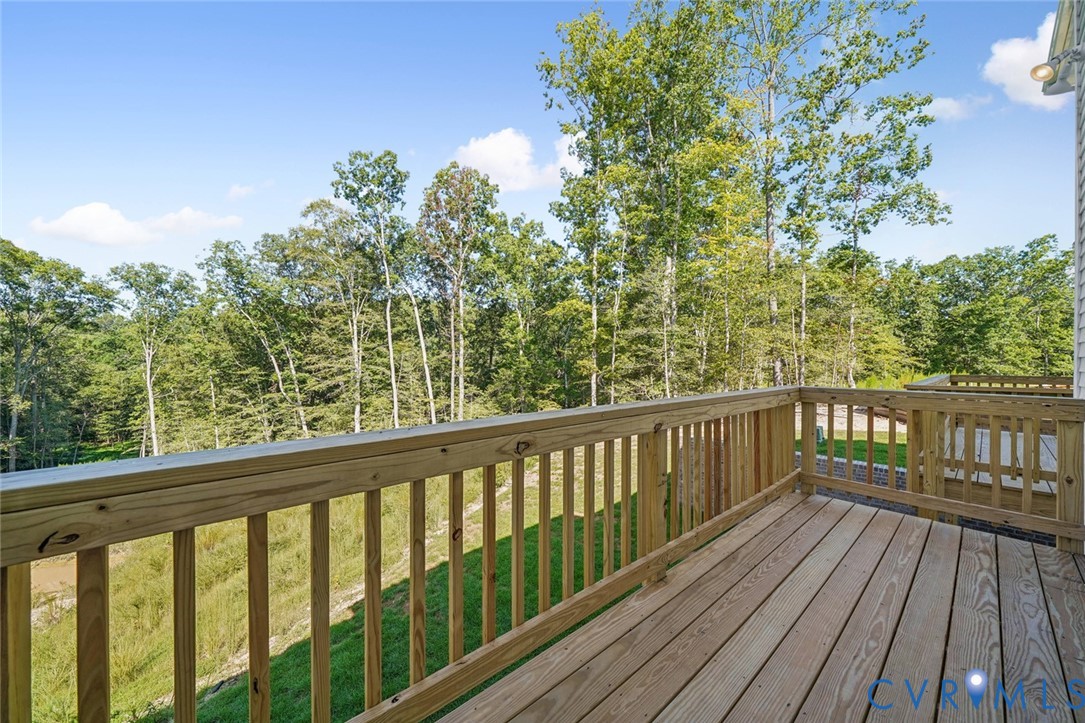 342 Mt Mccauley Way Aylett, VA 23009 - Photo 22 of 31 a view of balcony with wooden floor
