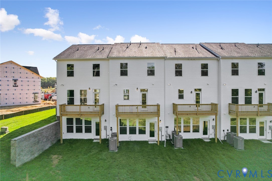 342 Mt Mccauley Way Aylett, VA 23009 - Photo 23 of 31 front view of a house with a yard table and chairs
