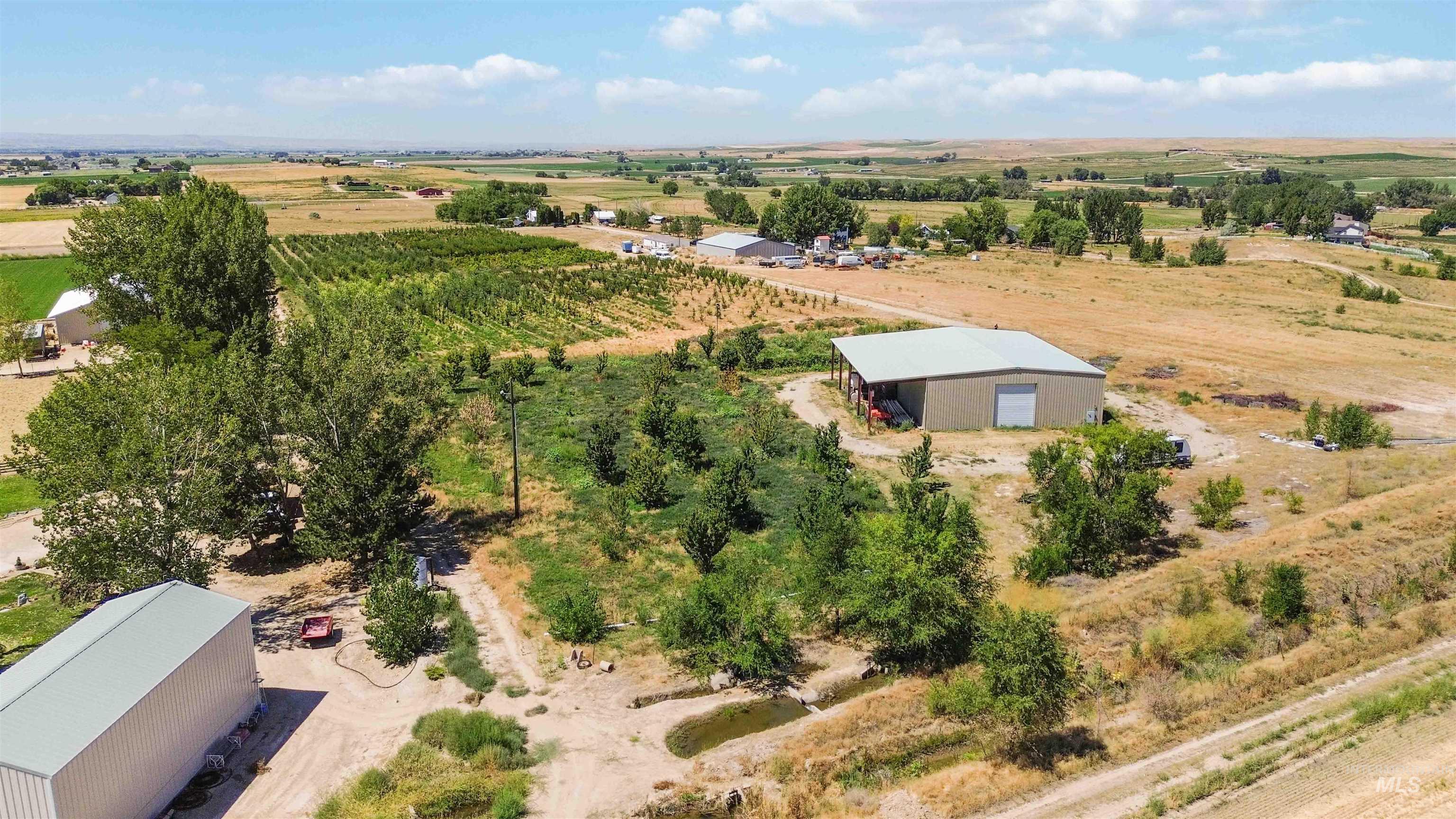 27260 Hop Road Caldwell, ID 83607 - Photo 3 of 21 Aerial view of sparsely populated area featuring extensive farmland