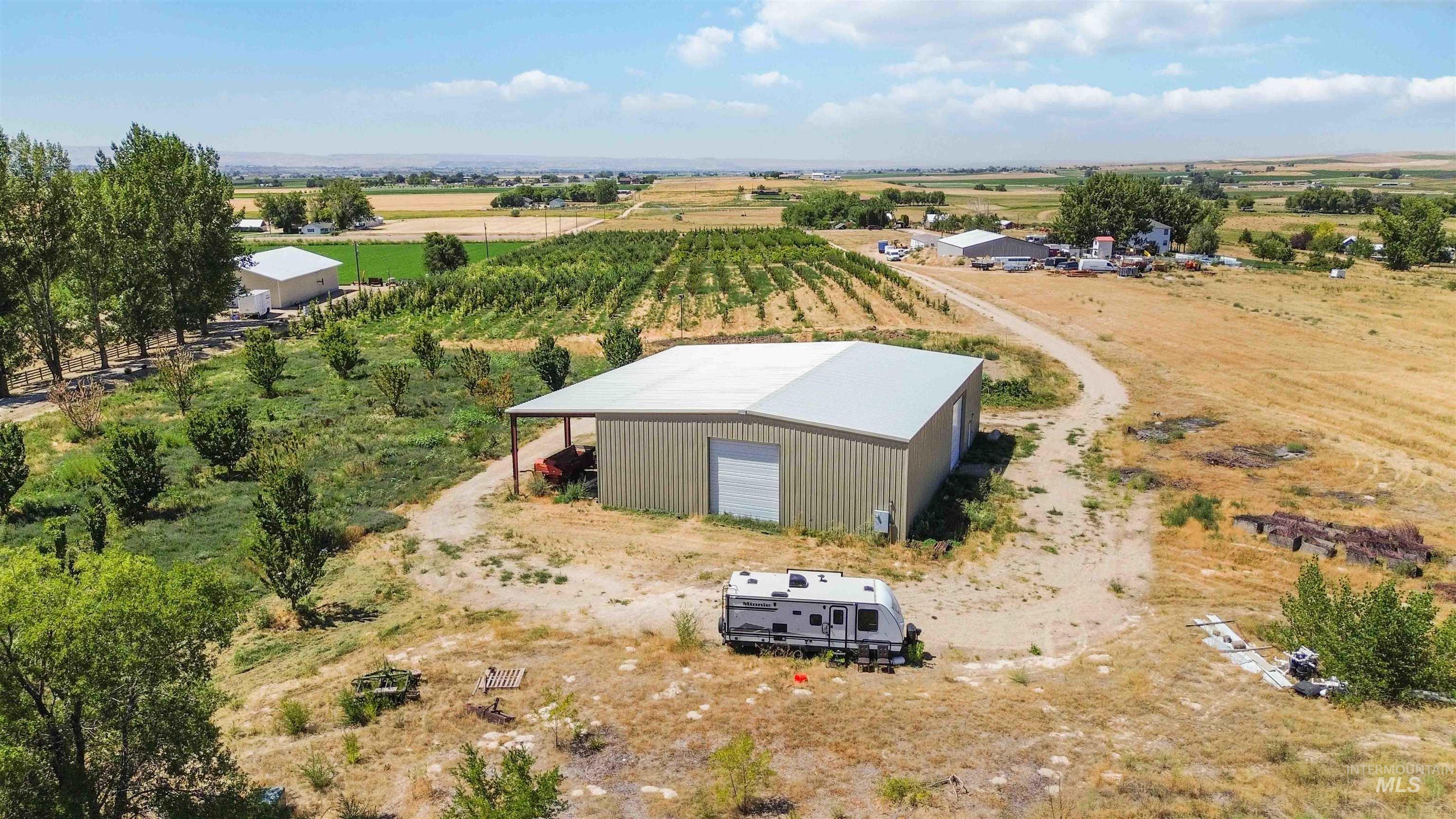 27260 Hop Road Caldwell, ID 83607 - Photo 7 of 21 Aerial view of sparsely populated area featuring large plots for crops