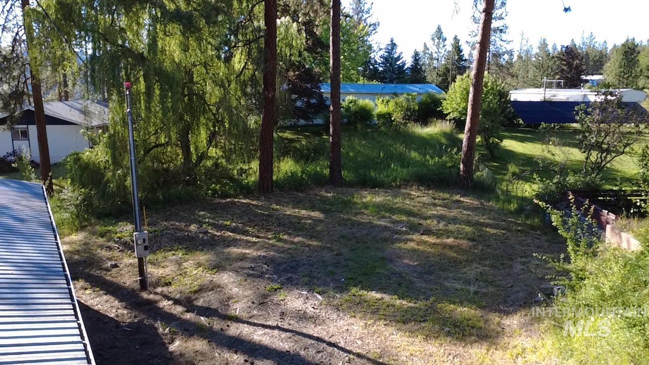 151 View Road Kamiah, ID 83536 - Photo 47 of 49 Expansive outdoor space featuring mature trees and a sloped terrain