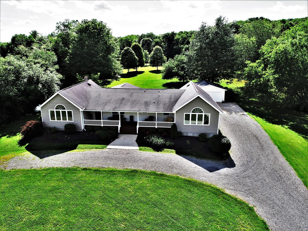 411 Niles Road Franklin, PA 16323 - Photo 1 of 1 a front view of a house with a yard