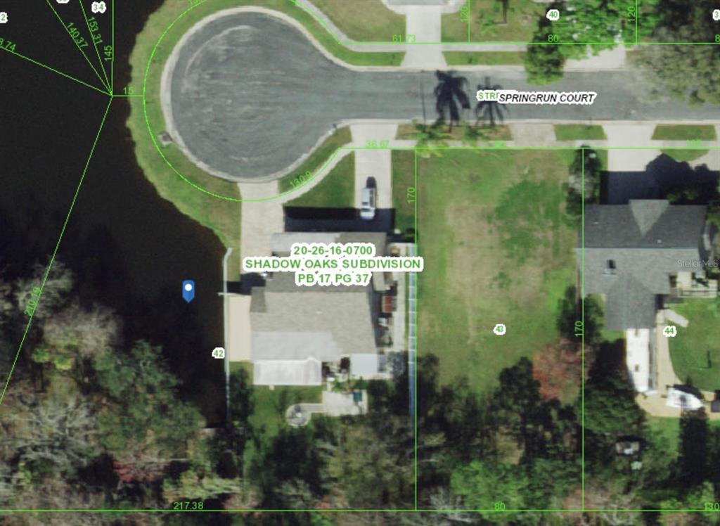 5904 Springrun Court Holiday, FL 34690 - Photo 53 of 53 an aerial view of a house with swimming pool and outdoor seating