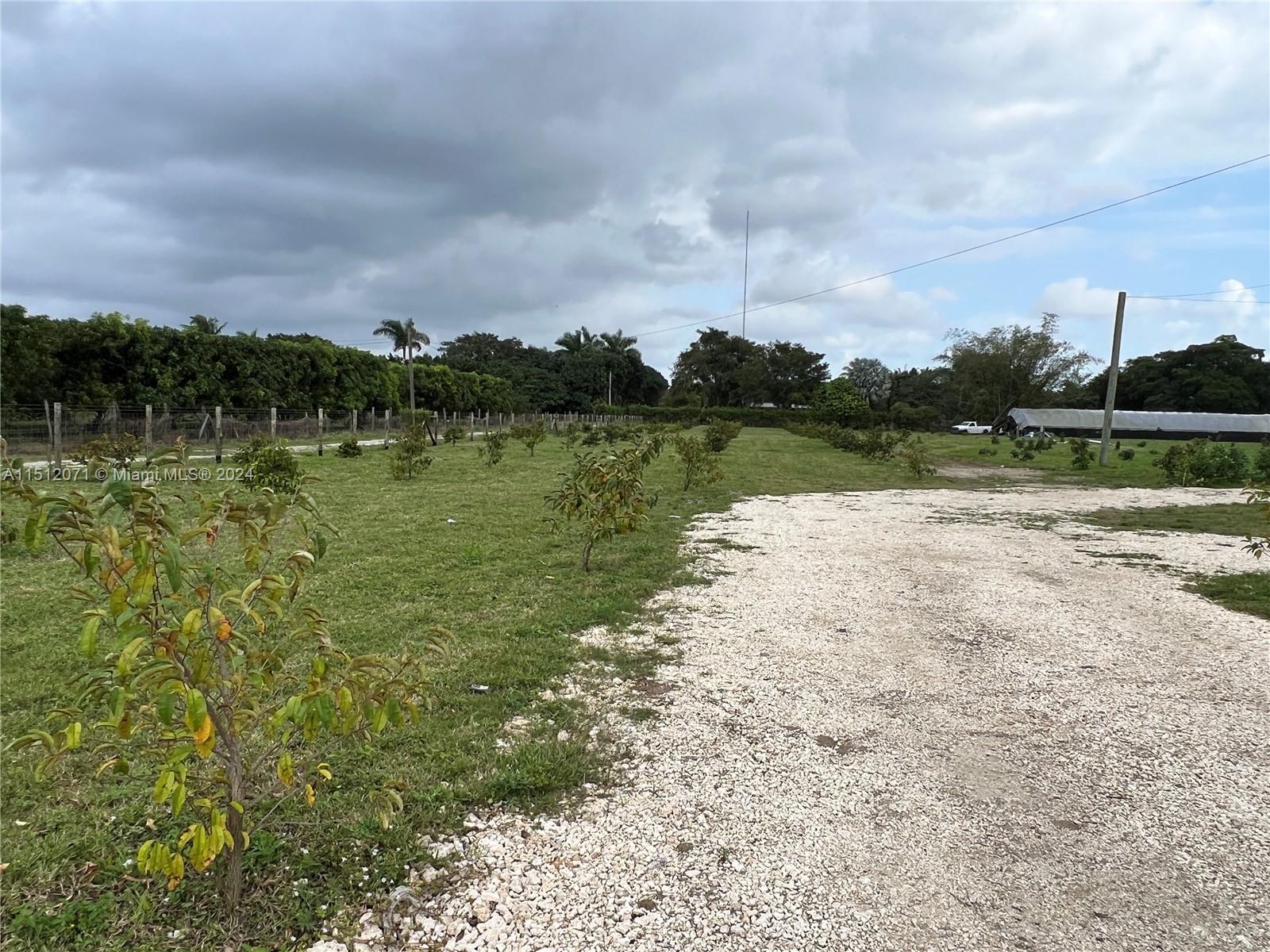 Redlands Homestead, FL 33031 - Photo 8 of 14 a view of a lake from a yard