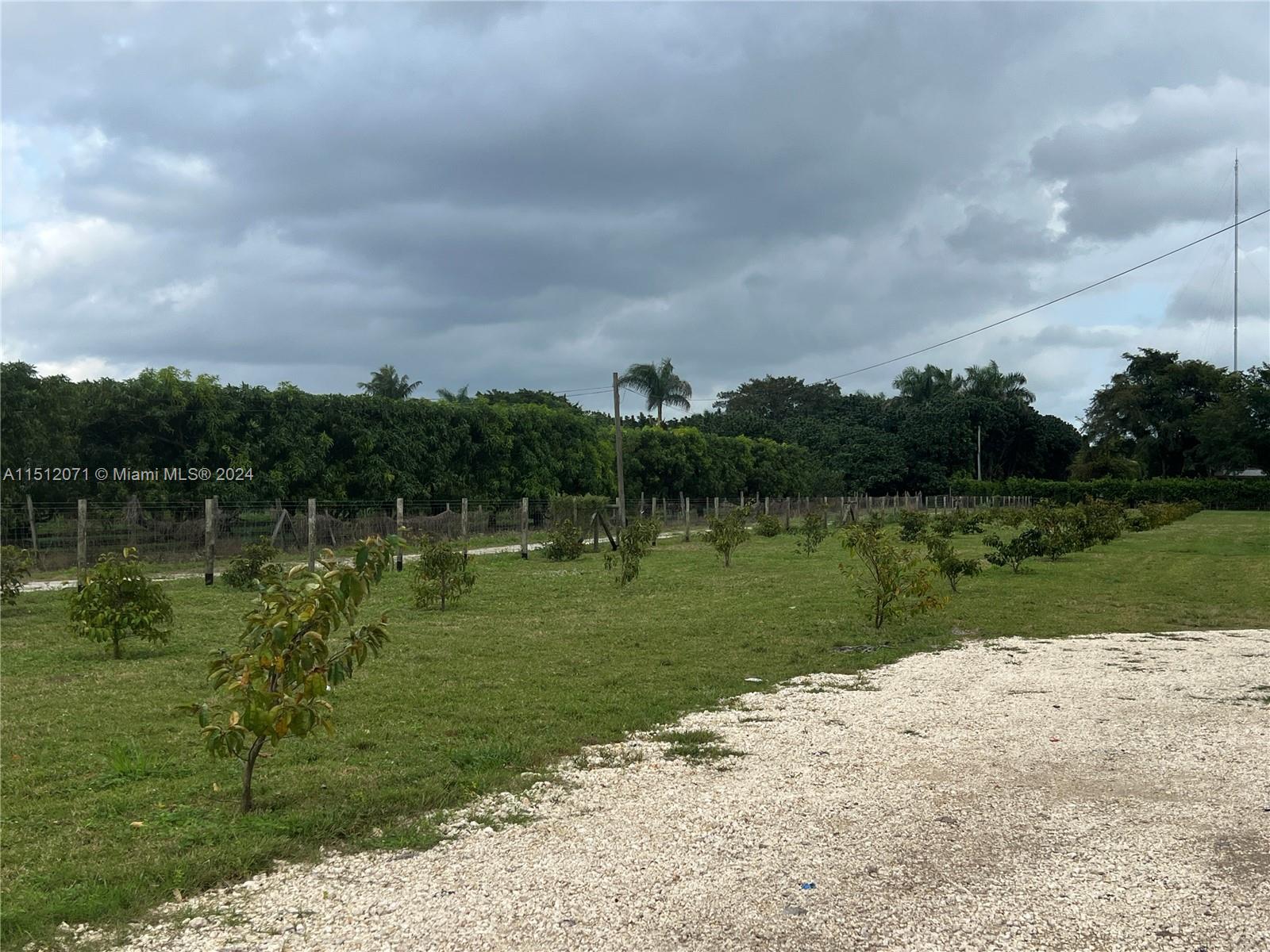 Redlands Homestead, FL 33031 - Photo 10 of 14 a view of a lake with a big yard