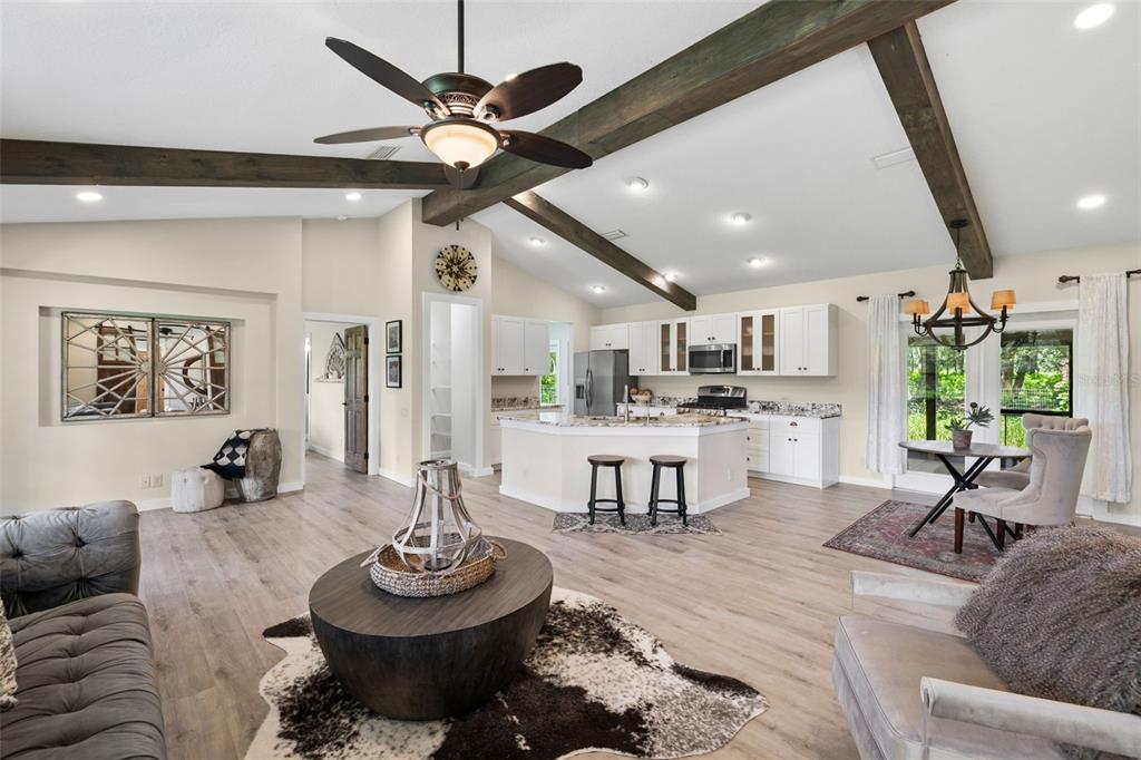 14765 Highway 41 Spring Hill, FL 34610 - Photo 11 of 61 a living room with furniture and a large window
