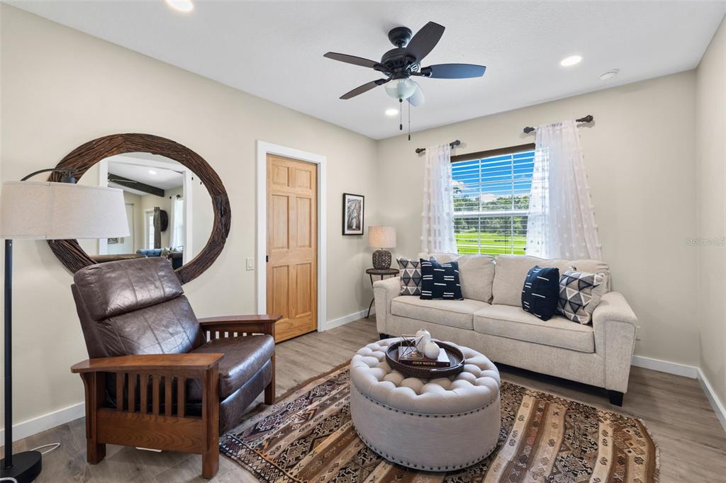 14765 Highway 41 Spring Hill, FL 34610 - Photo 15 of 61 a living room with furniture and a large window