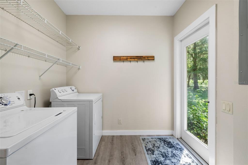 14765 Highway 41 Spring Hill, FL 34610 - Photo 19 of 61 a utility room with dryer and washer