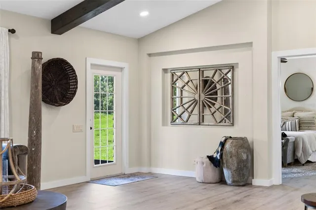 a living room with furniture and a window