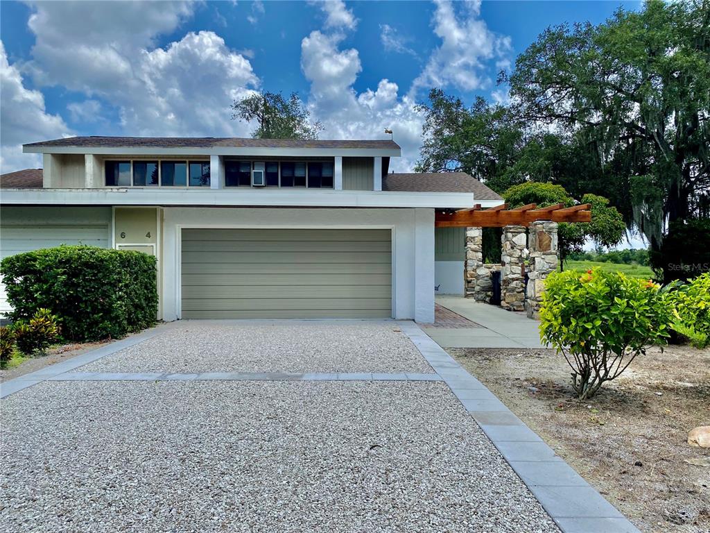 4 Nottingham Way Haines City, FL 33844 - Photo 1 of 1 front view of a house with a yard
