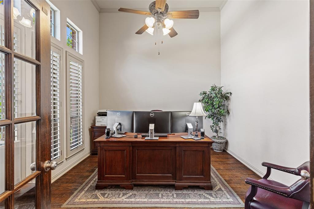1217 Windmere Way Allen, TX 75013 - Photo 11 of 38 Framed by French doors and tall windows, the executive office creates a bright and inspiring workspace for working from home in style.