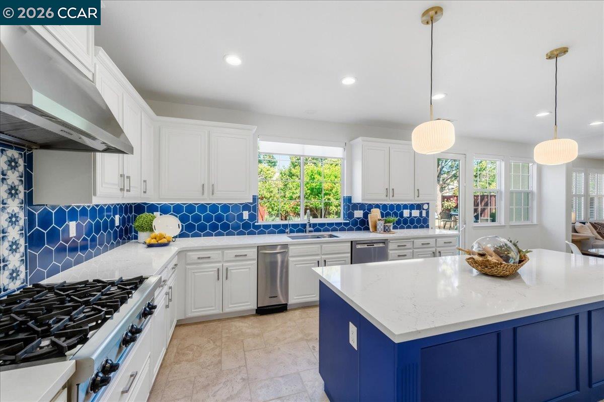211 Cullens Court San Ramon, CA 94582 - Photo 14 of 56 a kitchen with a sink a stove and window