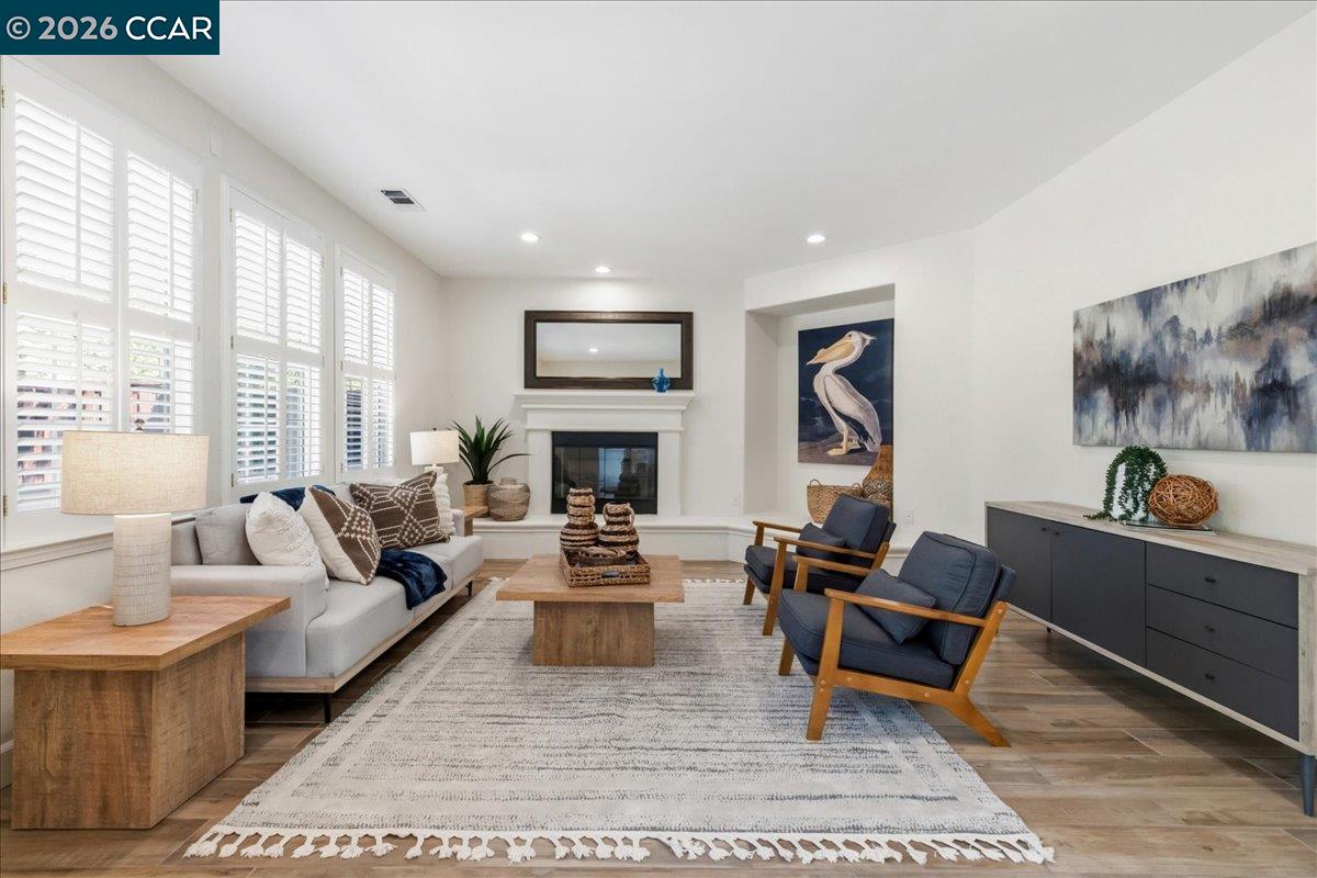 211 Cullens Court San Ramon, CA 94582 - Photo 18 of 56 a living room with furniture fireplace and window