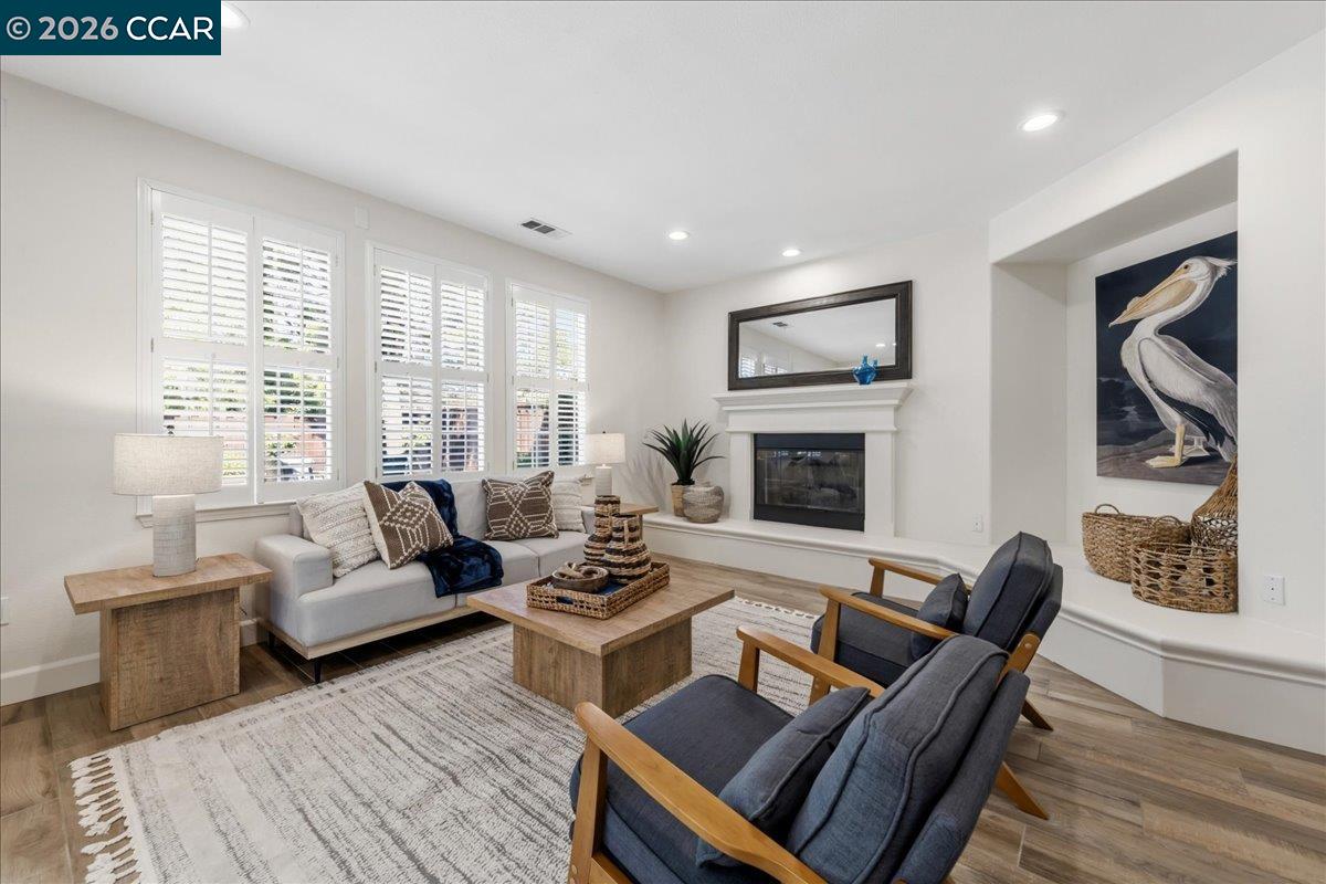 211 Cullens Court San Ramon, CA 94582 - Photo 19 of 56 a living room with furniture fireplace and window
