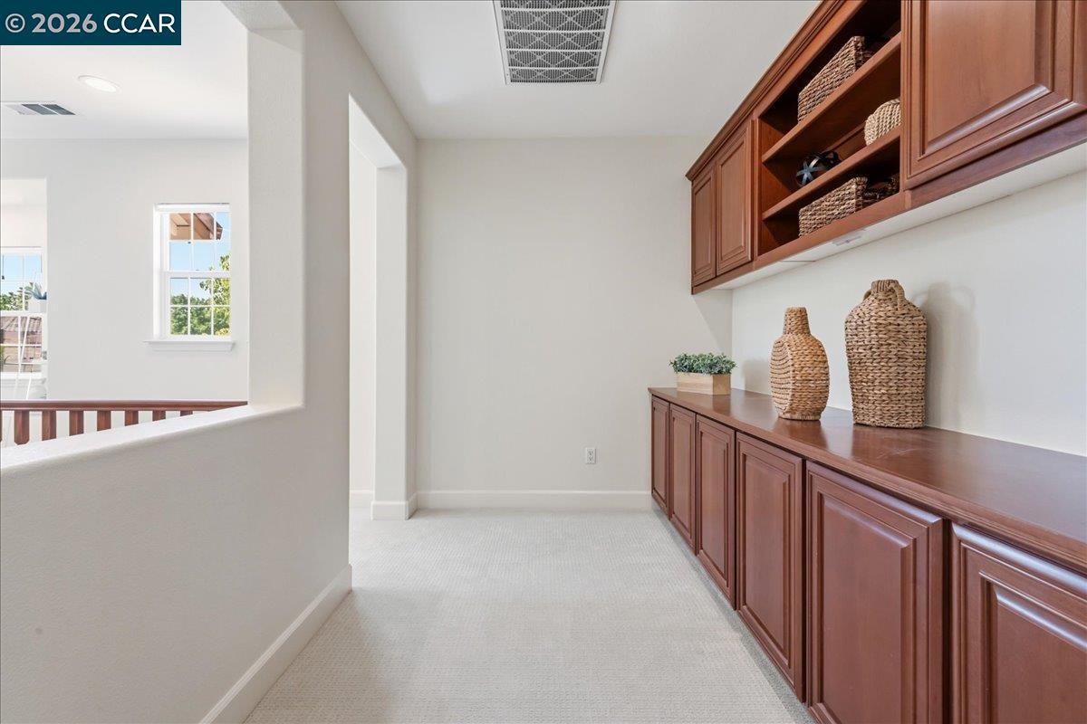 211 Cullens Court San Ramon, CA 94582 - Photo 22 of 56 a view of a hallway with windows