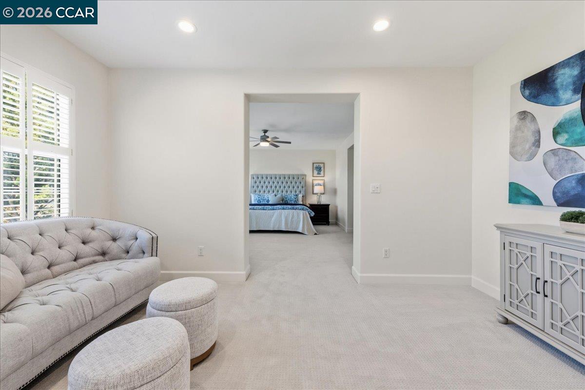 211 Cullens Court San Ramon, CA 94582 - Photo 25 of 56 a living room with furniture and baby crib