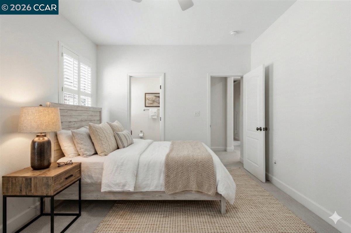 211 Cullens Court San Ramon, CA 94582 - Photo 33 of 56 a bedroom with a bed and lamp