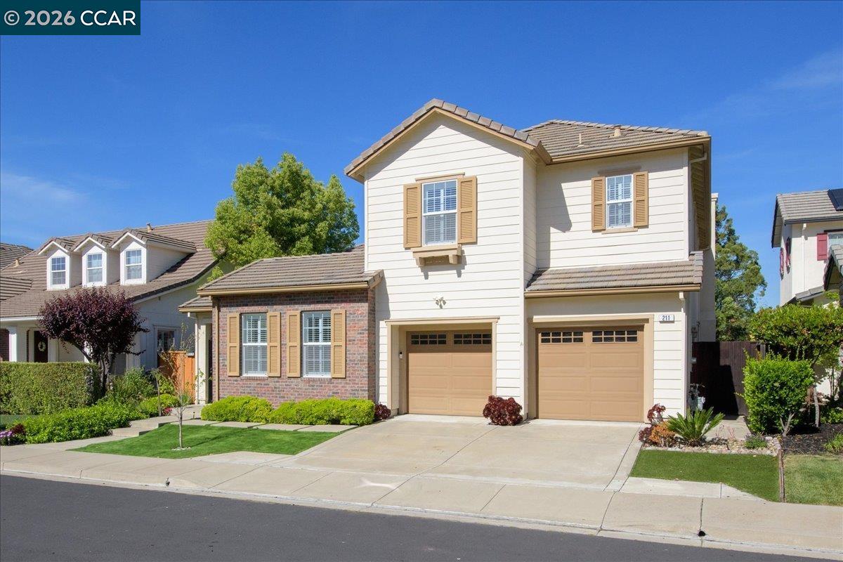 211 Cullens Court San Ramon, CA 94582 - Photo 53 of 56 a front view of a house with a garden and plants