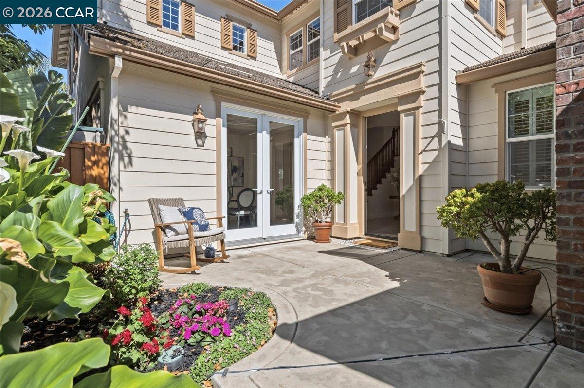 211 Cullens Court San Ramon, CA 94582 - Photo 7 of 56 a view of a patio with table and chairs and potted plants