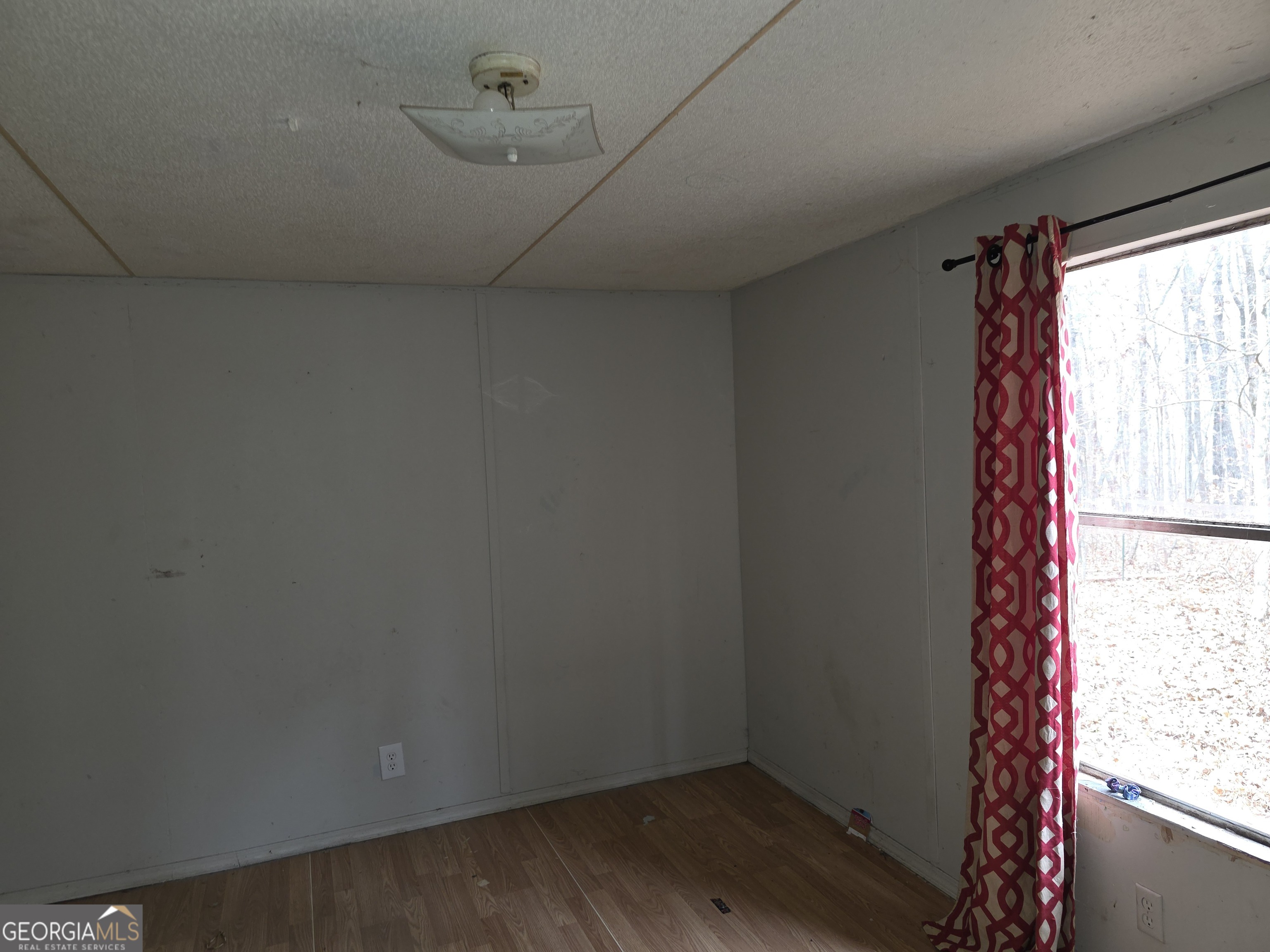 650 Wildcat Road Buchanan, GA 30113 - Photo 18 of 26 a view of small space with wooden floor and windows