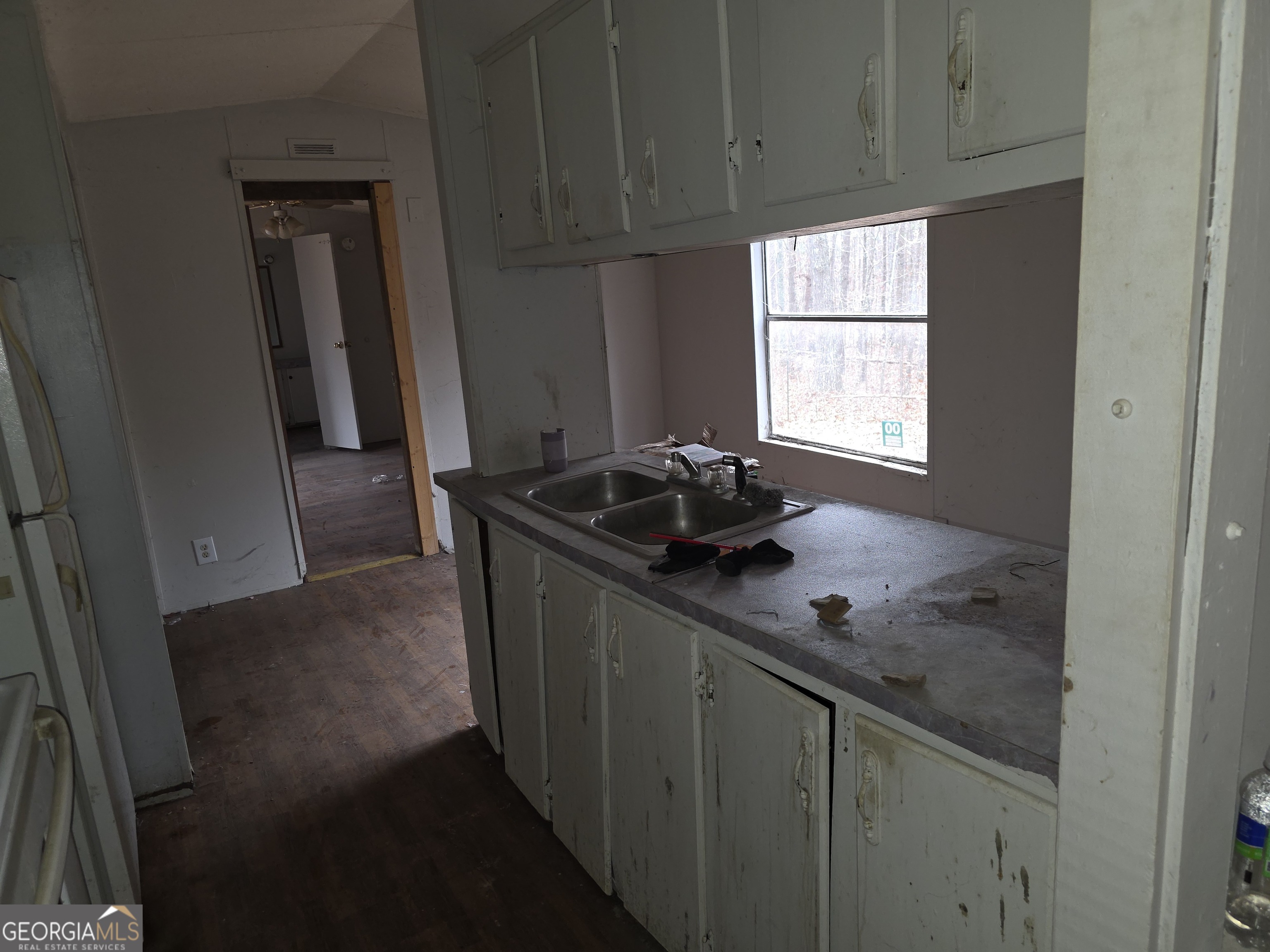 650 Wildcat Road Buchanan, GA 30113 - Photo 7 of 26 a bathroom with a sink and a window