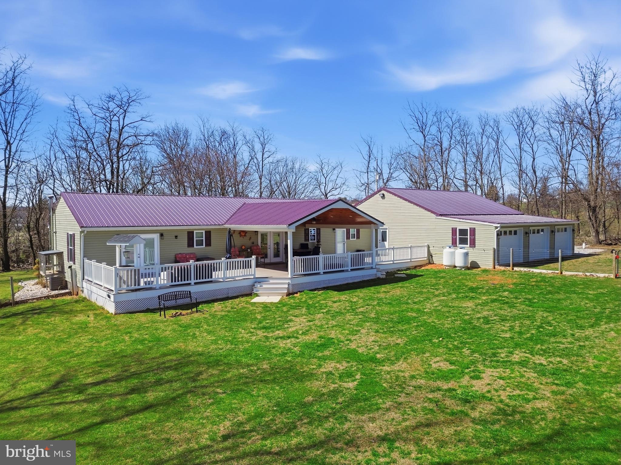 1025 White Oak Road Windsor, PA 17366 - Photo 1 of 70 a front view of a house with a yard table and chairs