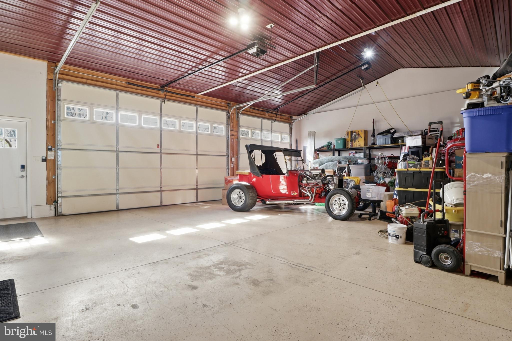 1025 White Oak Road Windsor, PA 17366 - Photo 33 of 70 a view of a garage with parked cars