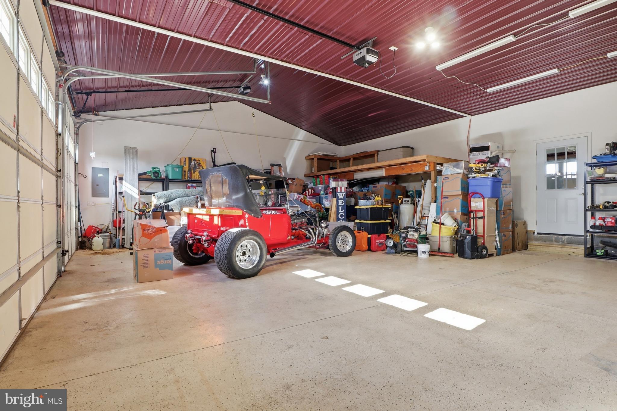 1025 White Oak Road Windsor, PA 17366 - Photo 34 of 70 a view of a garage with parked cars