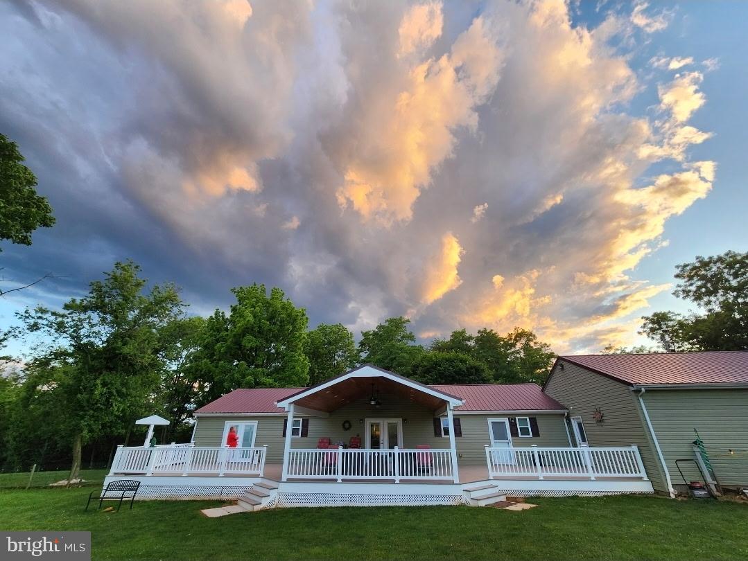 1025 White Oak Road Windsor, PA 17366 - Photo 60 of 70 a front view of a house with a garden and plants